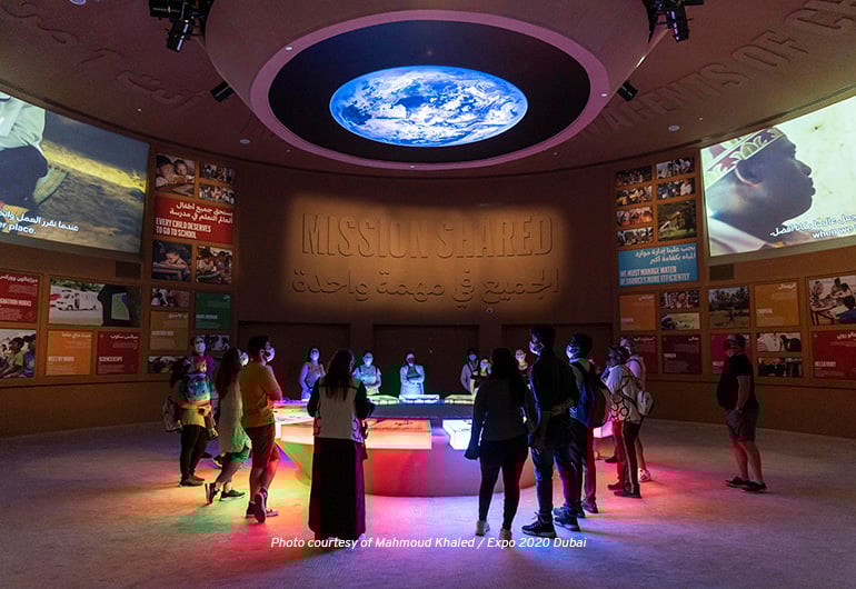 Visitors to EXPO 2020 walking through Mission Possible - The Opportunity Pavilion.